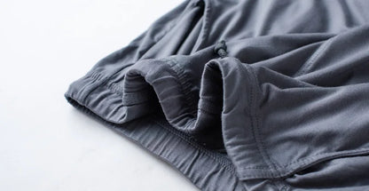 Men's spring and summer new modal pajamas two-piece short-sleeved trousers thin large size loose sports home wear suit sleepwear