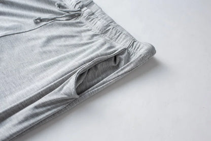 Men's spring and summer new modal pajamas two-piece short-sleeved trousers thin large size loose sports home wear suit sleepwear